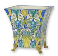 A BRONZE MOUNTED PORCELAIN PLANTER