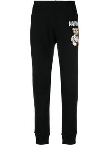 Moschino pantalon de jogging à logo imprimé - Noir