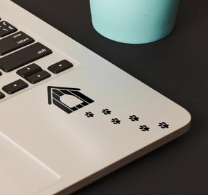 Laptop sticker voetafdrukken hond