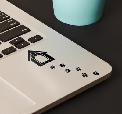 Laptop sticker voetafdrukken hond