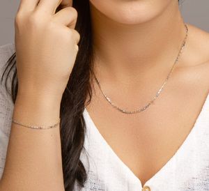 Armband Valkenoogschakel geel-en witgoud 2,1 mm 19 cm