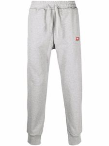 Diesel pantalon de jogging fuselé à logo brodé - Gris