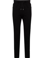 Dolce & Gabbana pantalon de jogging à plaque logo - Noir