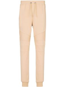 Balmain pantalon de jogging stretch à logo floqué - Tons neutres