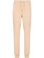 Balmain pantalon de jogging stretch à logo floqué - Tons neutres