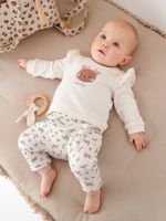 Set sweater en broek baby ecru