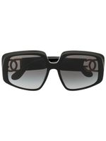 Dolce & Gabbana Eyewear lunettes de soleil oversize à plaque logo - Noir - thumbnail