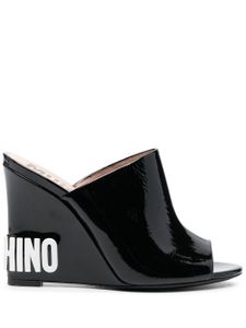 Moschino mules compensées à logo embossé - Noir