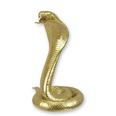 A BRONZE SCULPTURE OF A COBRA - GOLD COLOR