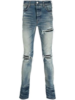 AMIRI jean skinny à effet usé - Bleu