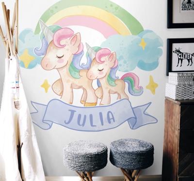 Sprookjes stickers Gelukkige eenhoorns boven een regenboog