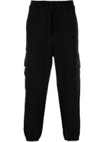 Comme des Garçons Homme pantalon de jogging à poches multiples - Noir