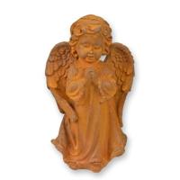 A RUSTY CAST IRON FIGURINE OF A PRAYING PUTTO