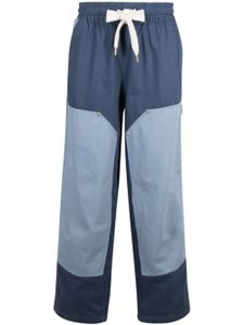 PUMA x Rhuigi pantalon à design superposé - Bleu