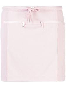 Courrèges minijupe à patch logo - Rose