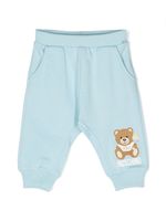 Moschino Kids pantalon à imprimé Teddy Bear - Bleu