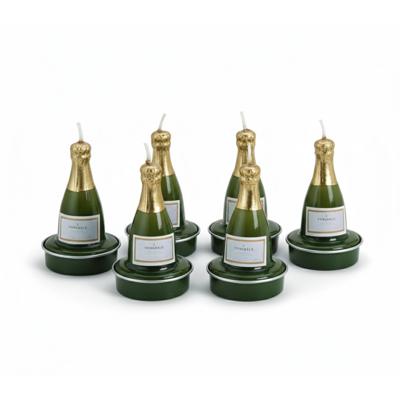 Champagnefles theelichtjes / waxinelichtjes - 6x stuks - 7 x 4 cm - kaarsjes - party Champagnefles theelichtjes / waxinelichtjes - 6x stuks - 7 x 4 cm - kaarsjes - party