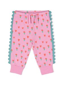 Stella McCartney Kids pantalon fleurie à ourlest festonés - Rose