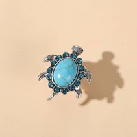 Verstelbare Ring in de Vorm van een Turkoois Schildpad met Blauwe Kristallen - Sieraden - Spiritueelboek.nl