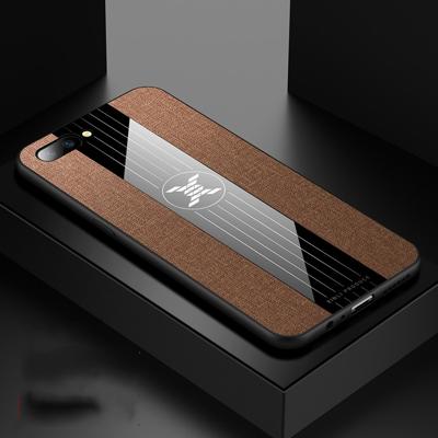 Voor OPPO R11 plus XINLI stiksels doek Textue schokbestendige TPU beschermhoes (bruin)