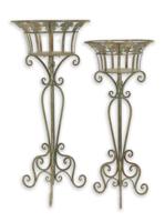 A PAIR OF IRON PLANTERS ON STAND