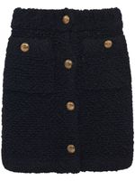 Prada minijupe en fil bouclé à boutonnière - Noir Prada minijupe en fil bouclé à boutonnière - Noir