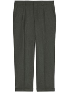 AMI Paris pantalon fuselé à design plissé - Gris