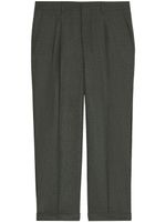 AMI Paris pantalon fuselé à design plissé - Gris