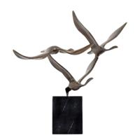 A BRONZE SCULPTURE OF TREE FLYING GEESE A BRONZE SCULPTURE OF TREE FLYING GEESE