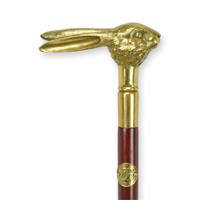 A BRONZE-HANDLED WALKING STICK