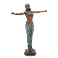 A BRONZE SCULPTURE OF AN EGYPTIAN DANCER