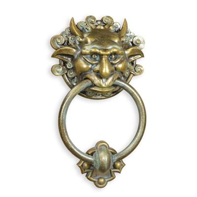 AN XXL CAST IRON DEVIL FACE DOORKNOCKER