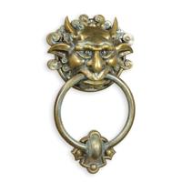 AN XXL CAST IRON DEVIL FACE DOORKNOCKER
