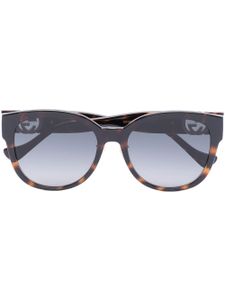 Gucci Eyewear lunettes de soleil rondes à effet écailles de tortue - Marron