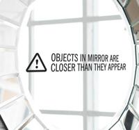 Sticker spiegel closer than they appear
