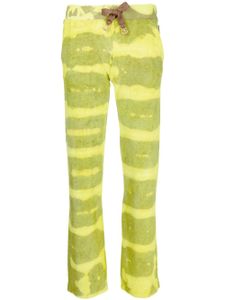 Stain Shade pantalon de jogging à imprimé tie dye - Vert