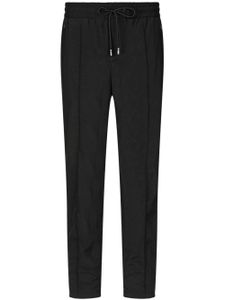 Dolce & Gabbana pantalon de jogging à plaque logo - Noir