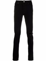 AMIRI jean slim à effet usé - Noir