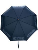 Moschino parapluie compact à logo imprimé - Bleu