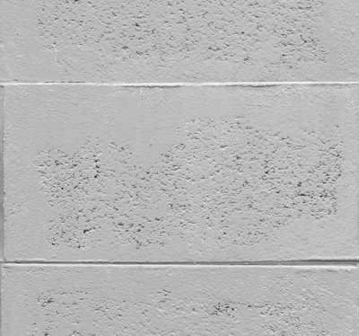 Behang beton grijs in blokjes
