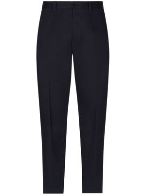 Dolce & Gabbana pantalon fuselé à étiquette logo - Bleu