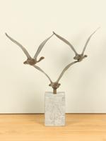 3 bronzen zwanen