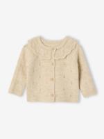 Gebreid vestje voor pasgeborenen in fantasie breisel met ruches. gemêleerd beige