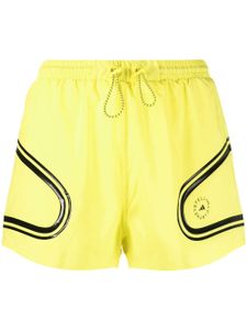 adidas by Stella McCartney short de sport à rayures - Jaune