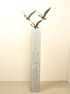 3 bronzen zwanen