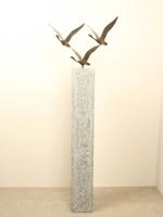 3 bronzen zwanen