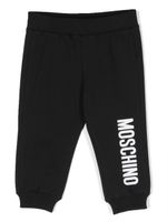 Moschino Kids pantalon de jogging fuselé à logo imprimé - Noir - thumbnail