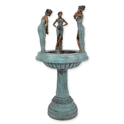 A BRONZE FOUNTAIN WITH 3 WOMEN