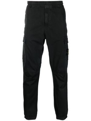 Stone Island pantalon cargo à patch Compass - Noir
