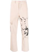 KidSuper pantalon droit à visages brodés - Tons neutres KidSuper pantalon droit à visages brodés - Tons neutres